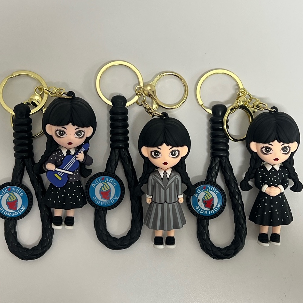 Black and Gold Keychain Set with Doll Charms